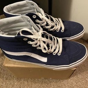 Mid high Navy Blue Vans.